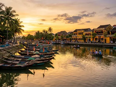 Thu Bon River in Hoi An during golden hour with fishing boats
