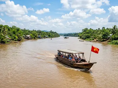 Traditional speedboat on the wide Mekong River