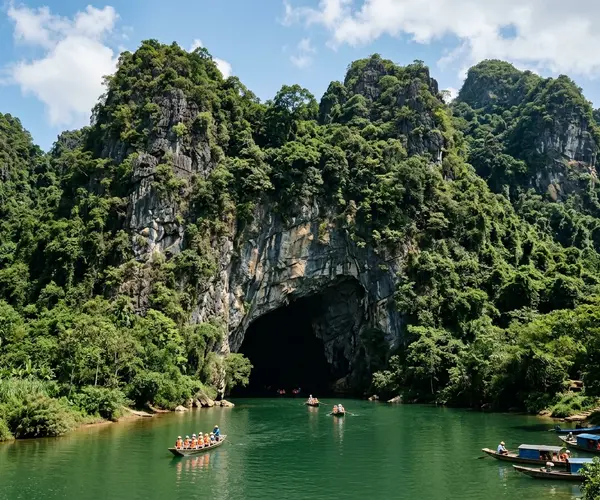 Phong Nha cave entrance with limestone formations and underground river, Quang Binh, Vietnam