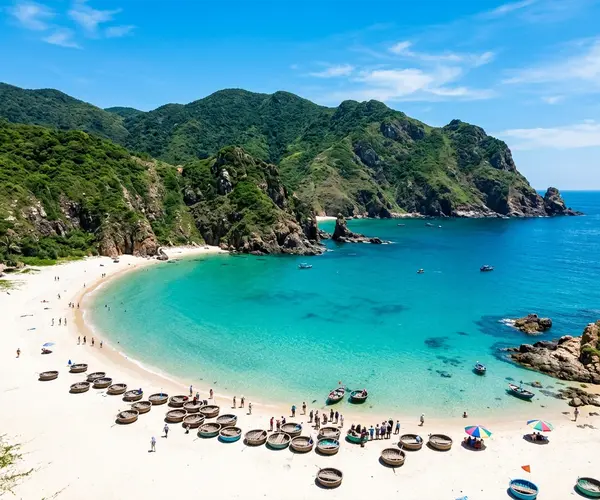 Qui Nhon crescent beach with Cham tower ruins on the coastline, Vietnam
