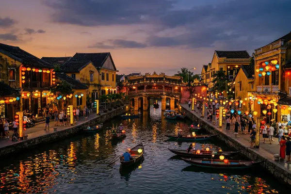 Hoi An Ancient Town yellow buildings illuminated at dusk