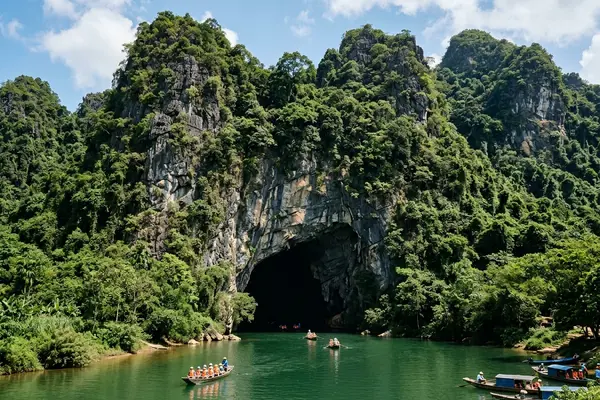Phong Nha cave entrance with limestone formations and underground river, Quang Binh, Vietnam