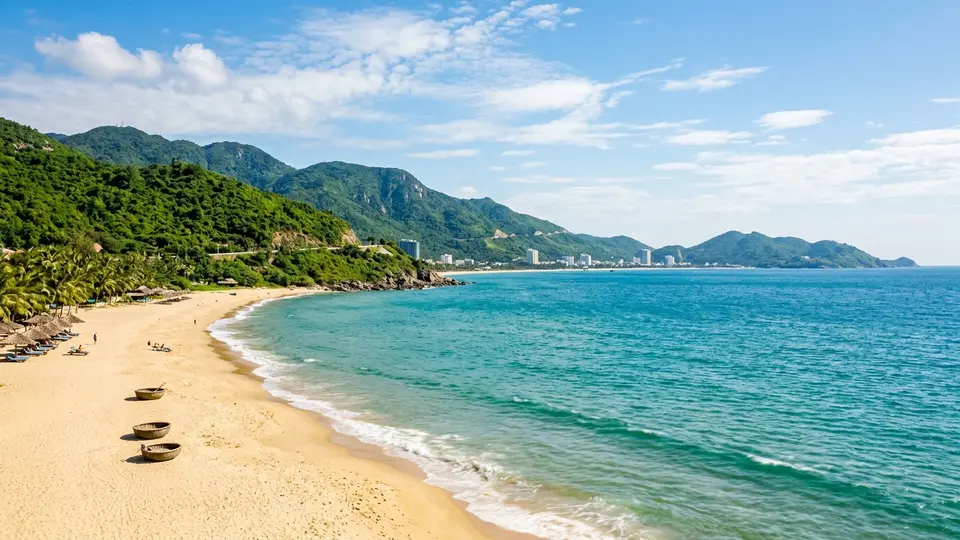 Da Nang coastline with golden sand beach and turquoise water on a bright sunny day